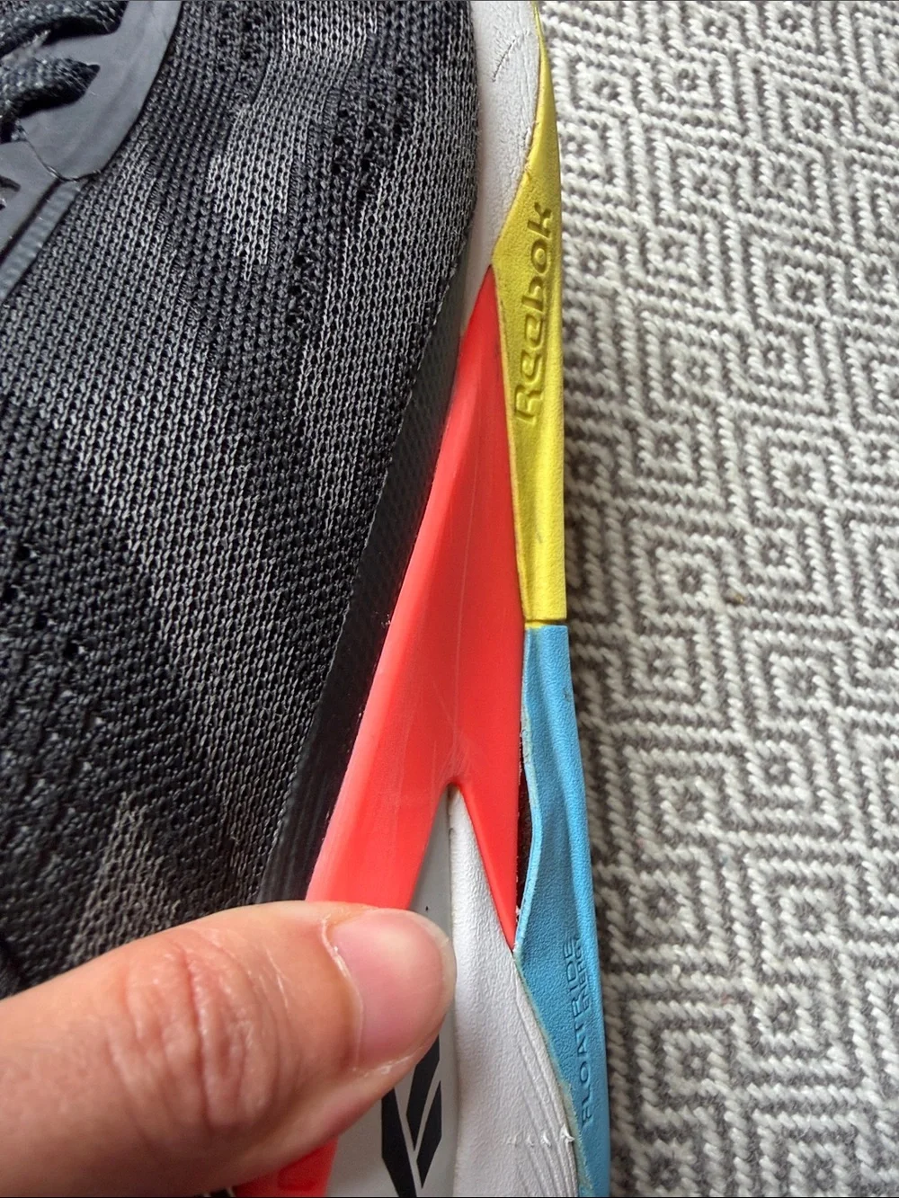 Reebok Nano X1 Black Running Shoes with Yellow, Red and Blue Accents